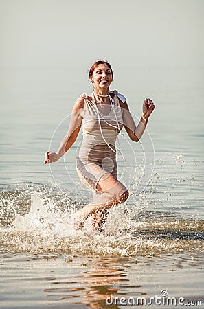 Woman against the sea