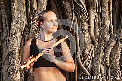 Woman with bamboo flute