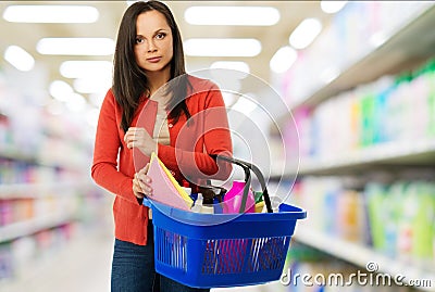 Woman with basket full of cleansers