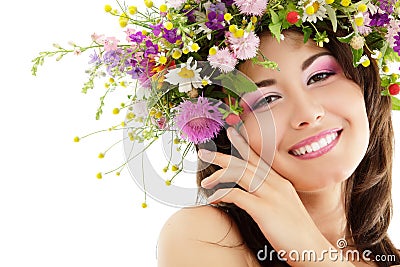 Woman beauty with summer wild flowers