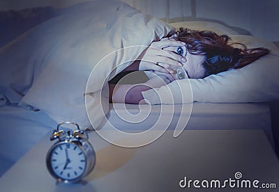Woman in bed with insomnia that can t sleep white background
