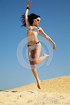 Woman in bikini on beach