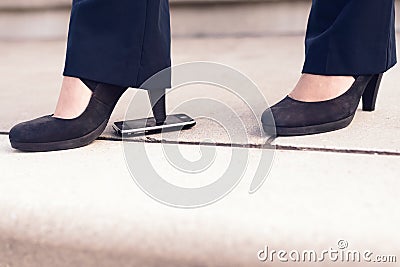 Woman in Black Heel Shoes Step on Phone