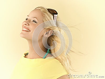 Woman With Blond Hair Blowing In Wind