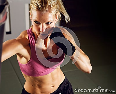Woman Boxing in Gym