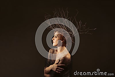 Woman With Branches as a Creative Head Piece
