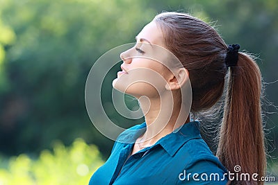 Woman breathing fresh air