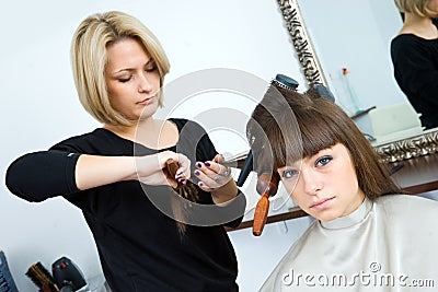 Woman with brushes in her hair