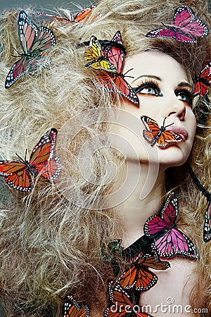 http://thumbs.dreamstime.com/x/woman-butterfly-curly-hair-13486626.jpg