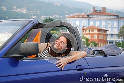 Woman in cabriolet