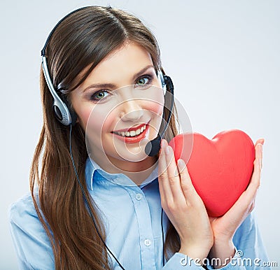 Woman call center operator hold love symbol Red heart. Close up