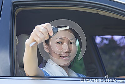 Woman with car key