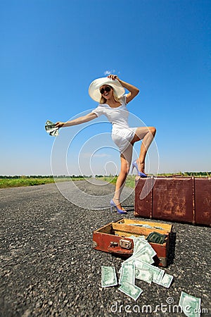 Woman with cash stops the car