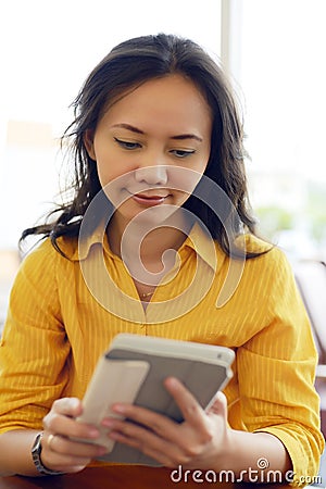 Woman Confused Using Tablet