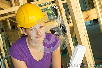 Woman construction worker looking frustrated