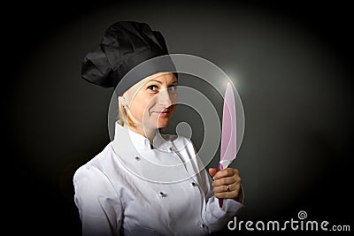 Woman cook chef with kitchen knife