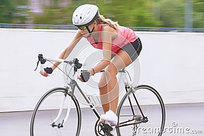 Woman cycling outdoors