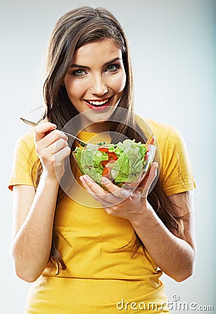 Woman diet concept portrait. Female model hold gre