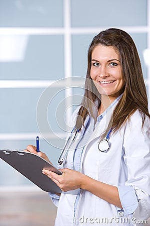 Woman doctor holding a chart