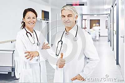 Woman doctor man doctor hospital corridor