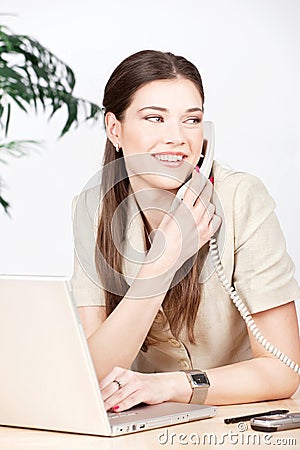 Woman doing phone call in the office