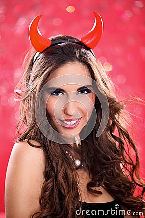 Woman dressed as pretty devil