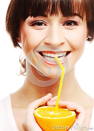 Woman drinking juice with straw