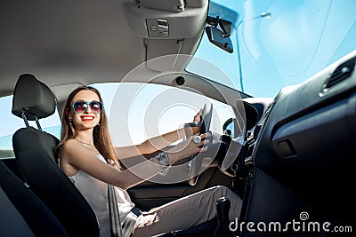 Woman driving her car