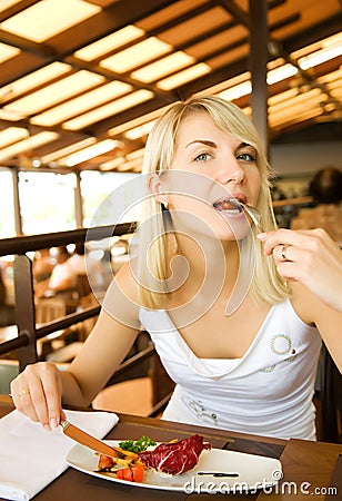 Woman eating vegetarian food
