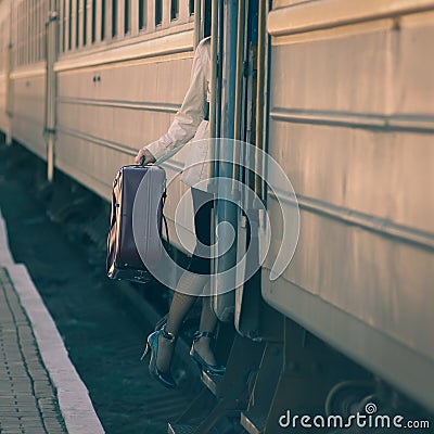 Woman entering into train car