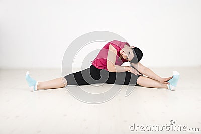 Woman fitness on white laminate flooring