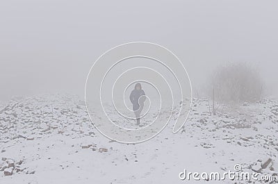 Woman in the fog