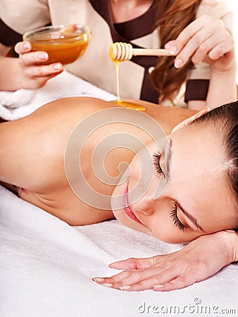 Woman getting spa treatment outdoor.