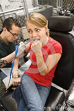 Woman Getting Tattoo. Royalty Free Stock Photo - Image: 2677575