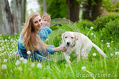 Woman with girl and dog