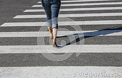 Woman going on the crosswalk