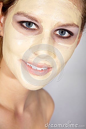 Woman with great makeup and face mask