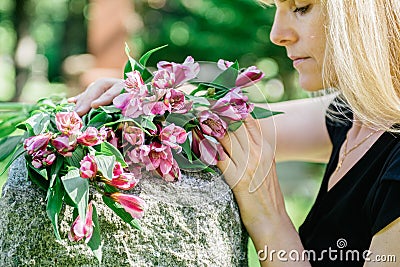 Woman Grieving at Grave