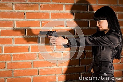 Woman With Hand Gun