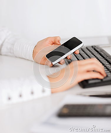 Woman hand with smartphone