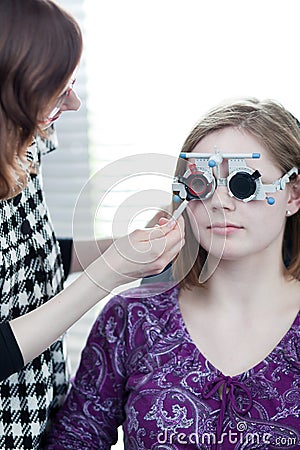 Woman having her eyes examined by an eye doctor