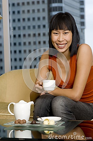 Woman Having Tea