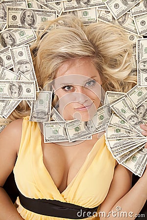 Woman head in money with money fan