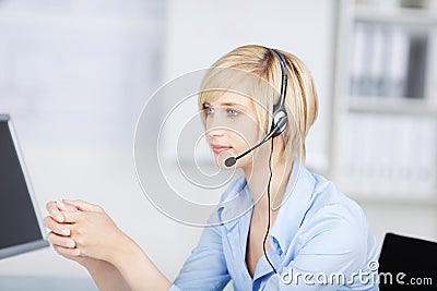 Woman with headset listening