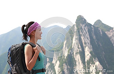 Woman hiker mountain peak