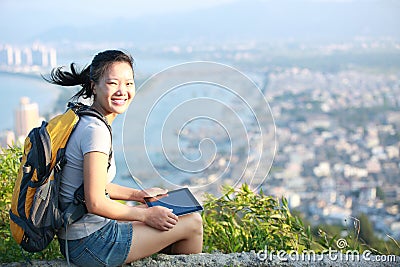Woman hiker mountain peak
