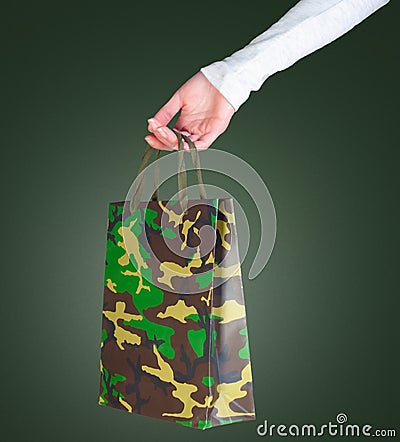 Woman holding a bag of military