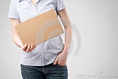 Woman Holding a Cardboard Sign