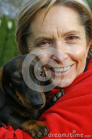 Woman holding a dog