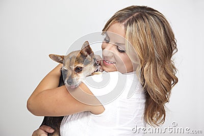Woman hugging pet dog